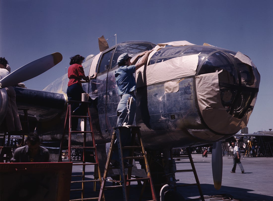A North American Aviation B-25 Mitchell bomber is prepared for painting on the outside assembly line at the North American Aviation plant