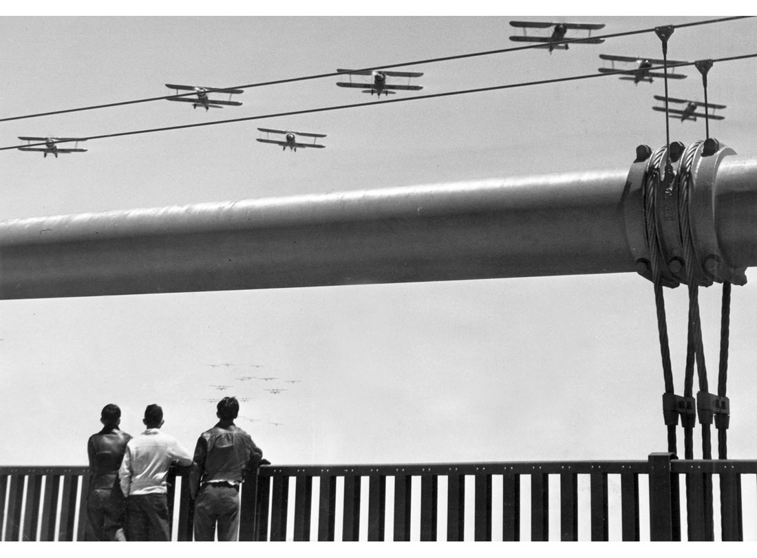 Airplanes flying over the Golden Gate Bridge during Opening Day Ceremonies