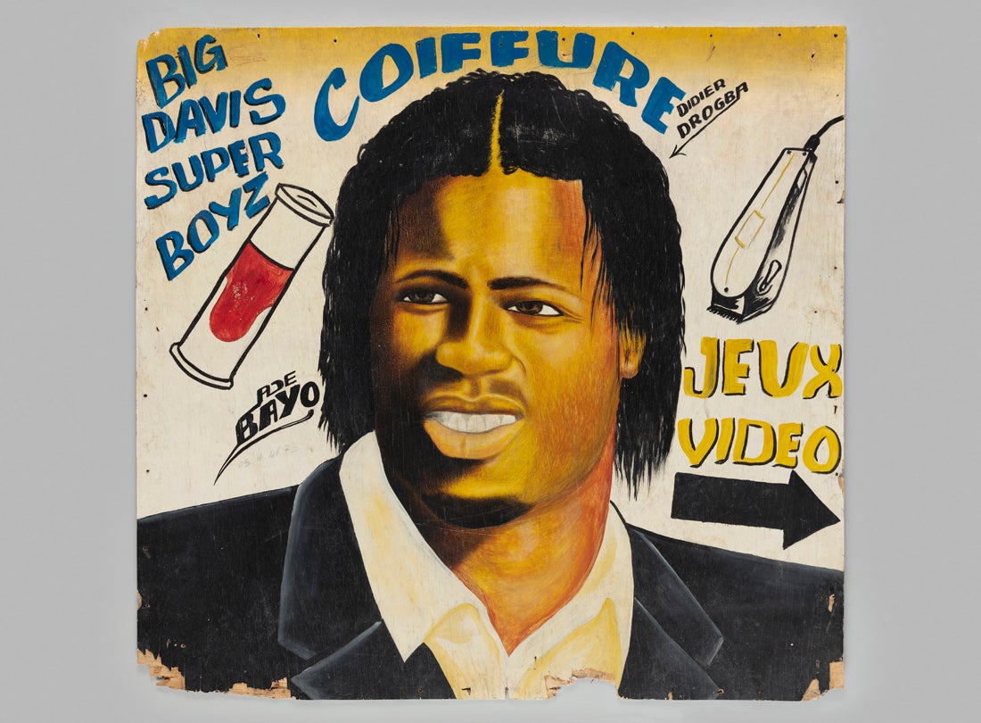 Didier Drogba barbershop sign  c. 2004