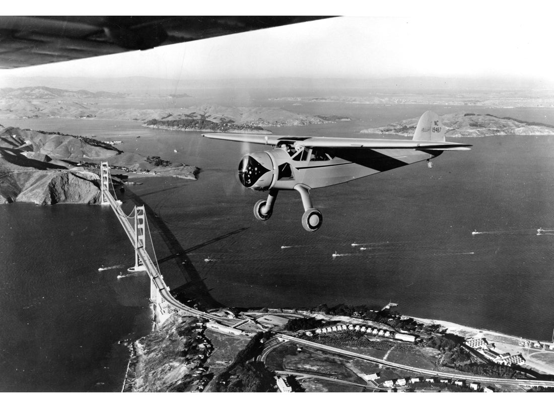 Cessna C-145 Airmaster near Fort Point on the south anchorage of the Golden Gate Bridge c. 1945