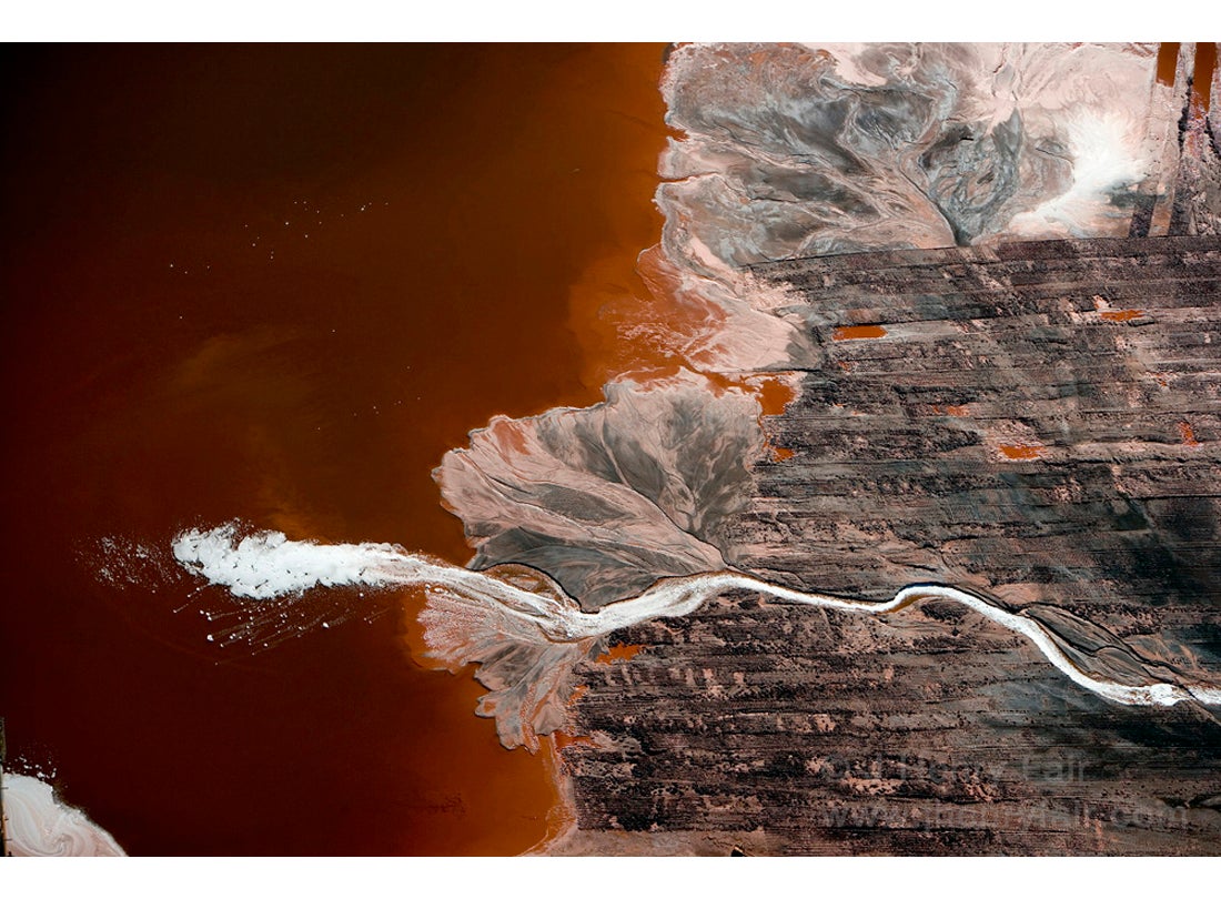 Expectoration: Plume of foam in bauxite waste, Darrow, Louisiana