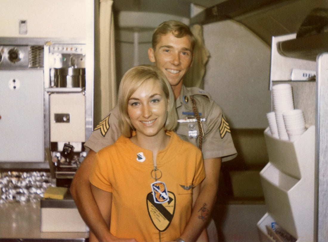 Flying Tiger Line flight attendant Leslie Ann Pfeifer aboard a MAC charter flight  c. 1968