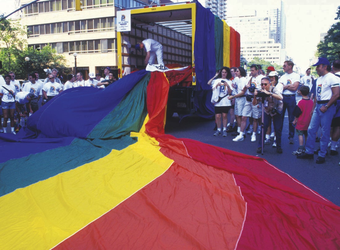 Unloading the mile-long rainbow flag created by Gilbert Baker and a team of volunteers for the 25th Anniversary of the 1969 Stonewall riots. The flag was carried by 5,000 people on First Avenue in New York City