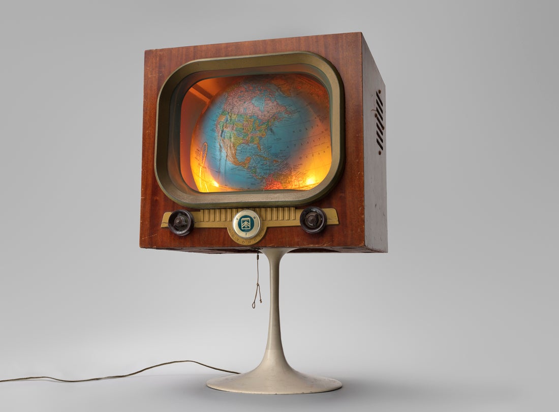 The World is on Television Today  c. 1987 Mickey McGowan (b. 1946) television cabinet, globe, lighting, stand Courtesy of Mickey McGowan, Unknown Museum Archives L2023.0301.056a-b
