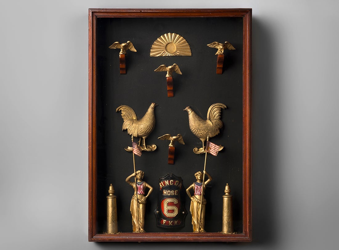 Rincon Hose Company Number 6 shadow box with helmet shield and hose cart ornaments  c. 1864