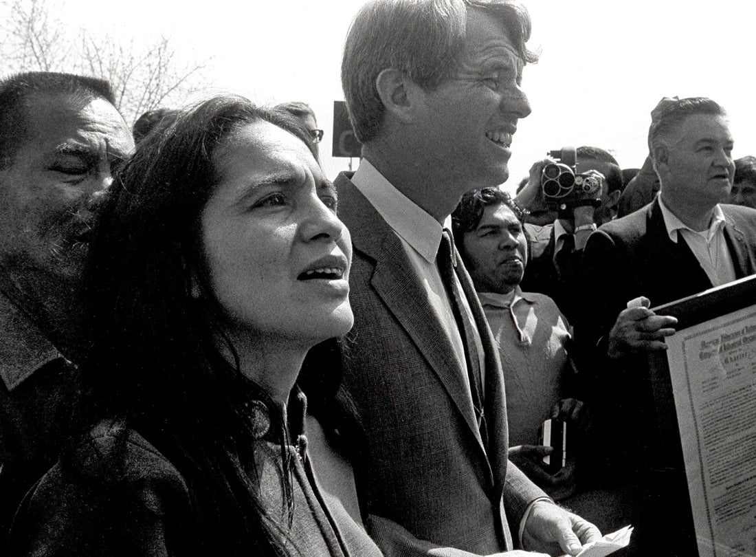 Dolores Huerta and Senator Robert Kennedy at a press conference celebrating the end of the 25-day fast by César Chávez, Delano