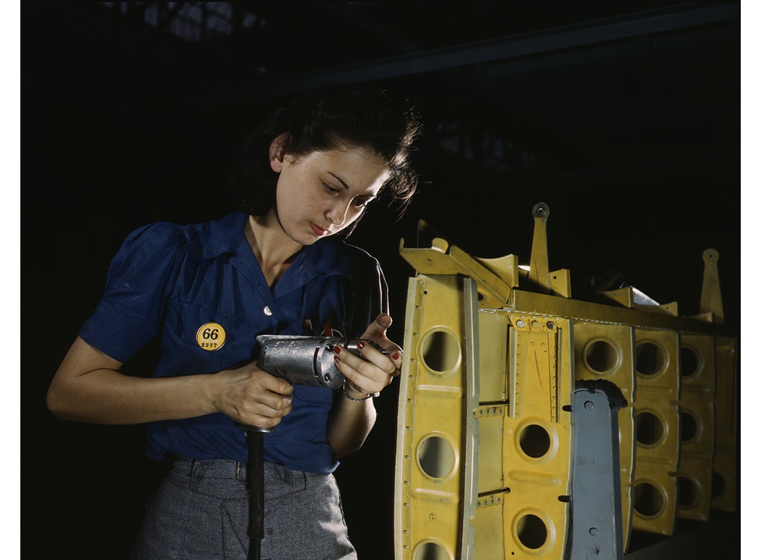 Assembling a wing section for a North American P-51 Mustang fighter plane at the North American Aviation plant