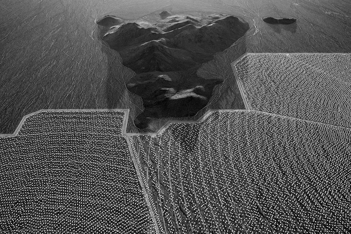#9499, a hill formation rises above the alluvial slope at the eastern boundaries of units 2 and 3 with heliostat (mirror) installation complete  2013