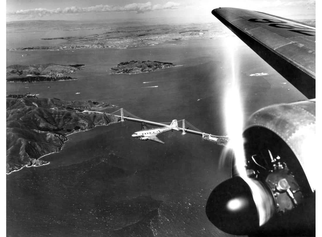 TWA (Trans World Airlines) Douglas DC-3 above the Golden Gate Bridge c. 1945