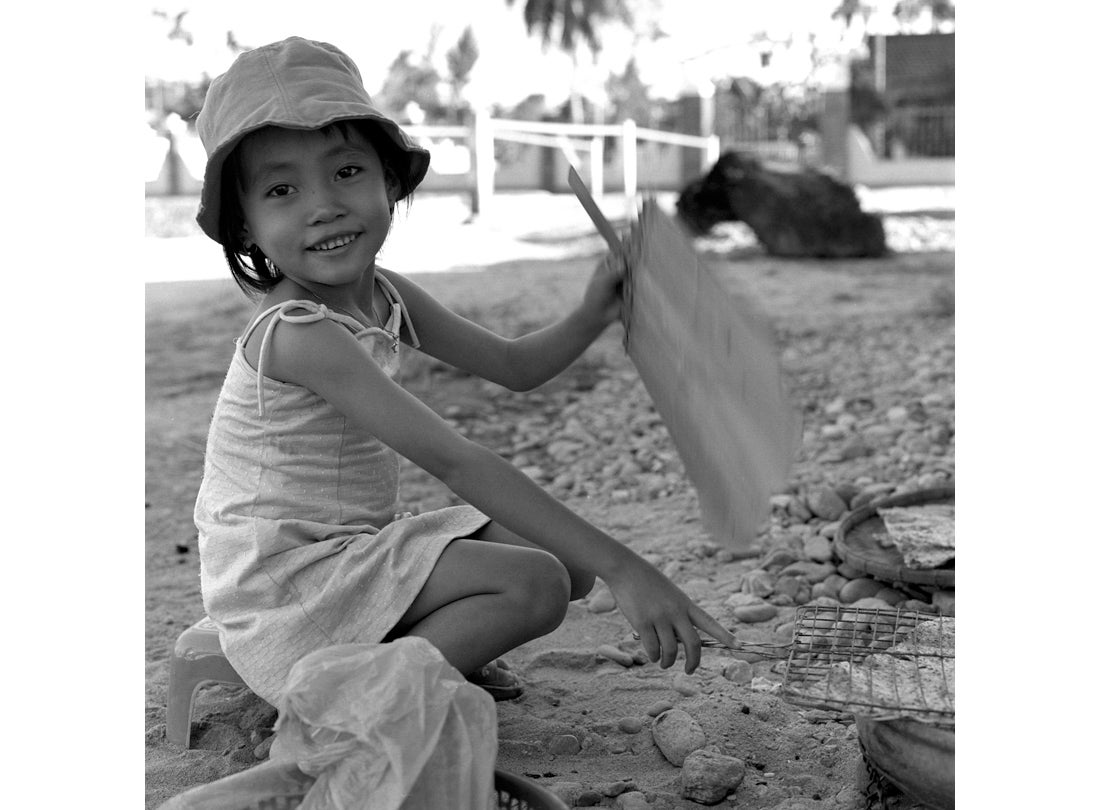 Girl with Fan, Hoi An, Vietnam