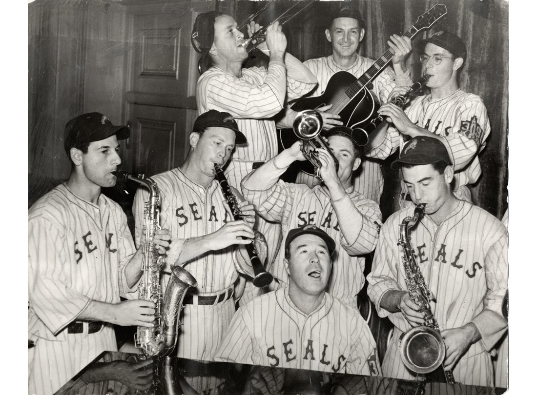 Seals players posing with instruments at the Palace Hotel 