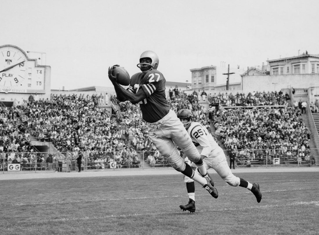 Wide receiver R. C. Owens makes a leaping catch during a preseason 24-17 victory over Washington at Kezar Stadium   August 16, 1959