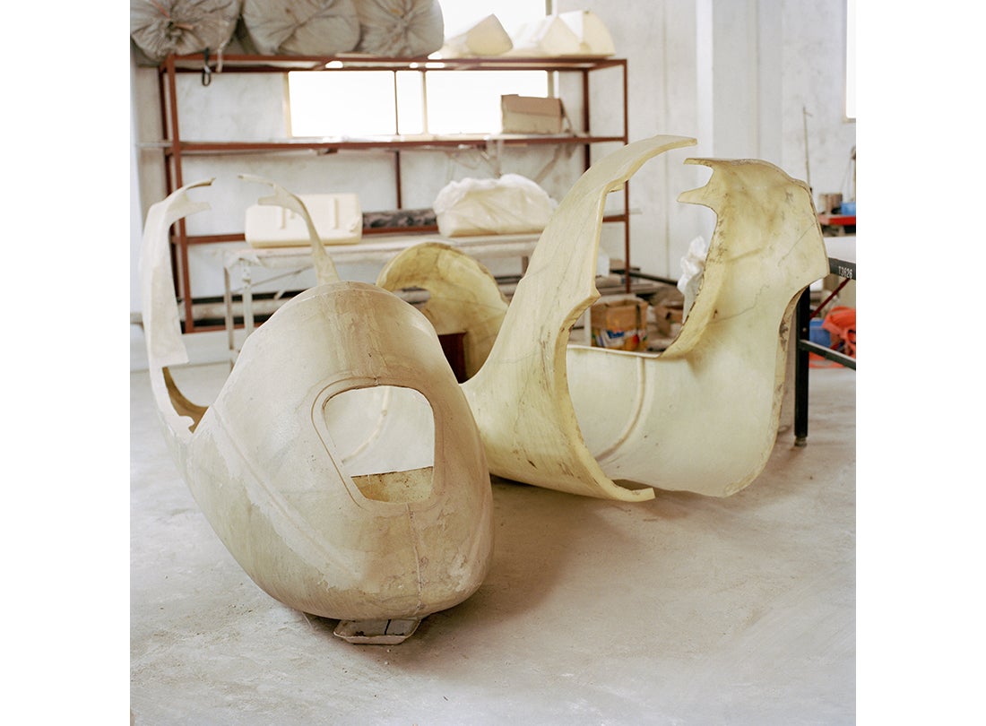 Damaged airplane bodies are kept in storage at Su Guibin’s factory  2015