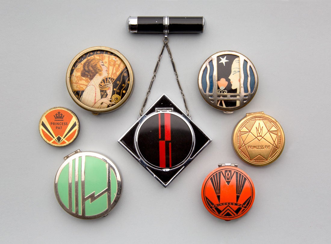 Assorted compacts and eye shadows  