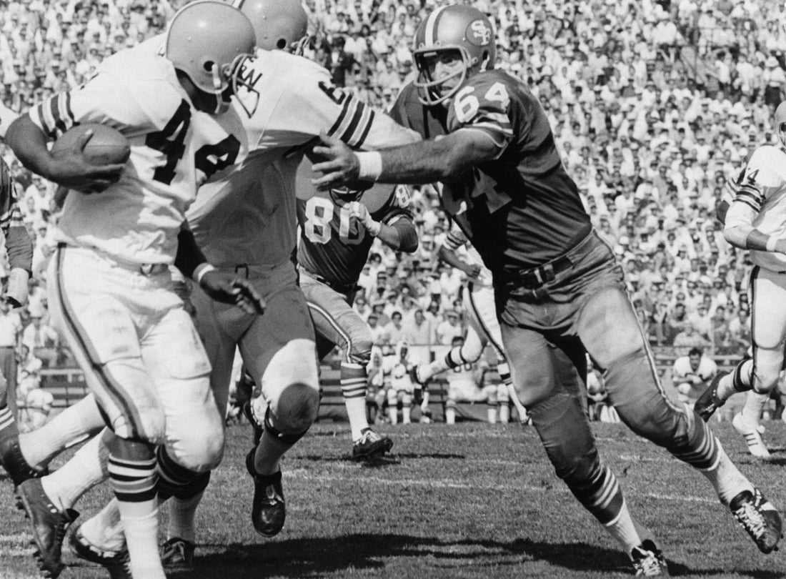 Linebacker Dave Wilcox prepares to tackle running back Leroy Kelly during the third quarter of a 34-31 victory over the Cleveland Browns at Kezar Stadium