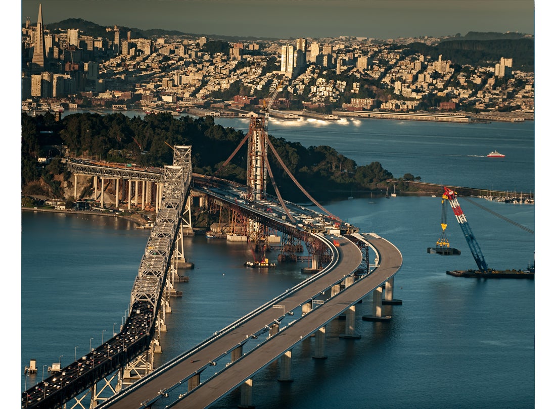 Lifter places deck section 