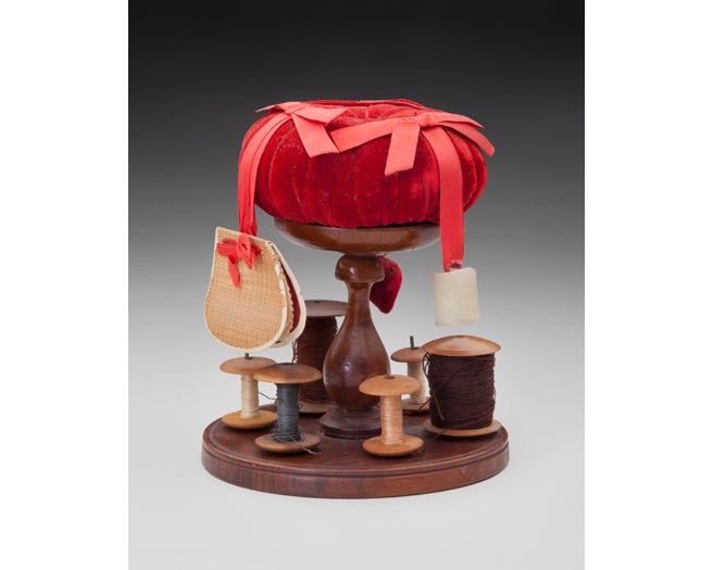 Spool holder with pincushion