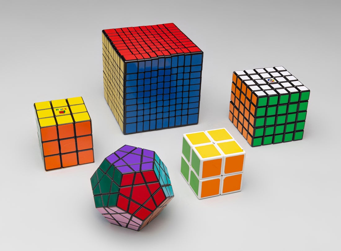Rubik’s cube, puzzle cubes, speed cube, and Megaminx 12-sided cube  late 20th century