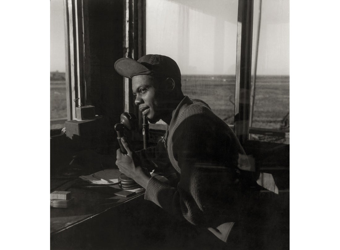 Sgt. William P. Bostic, 332nd Fighter Group, in the control tower  March 1945