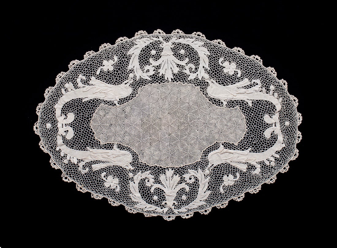 Doily with dolphin theme  early 1900s crochet lace Orvieto, Italy Collection of Lacis Museum of Lace and Textiles, Berkeley, CA JHE29502 L2013.3501.040