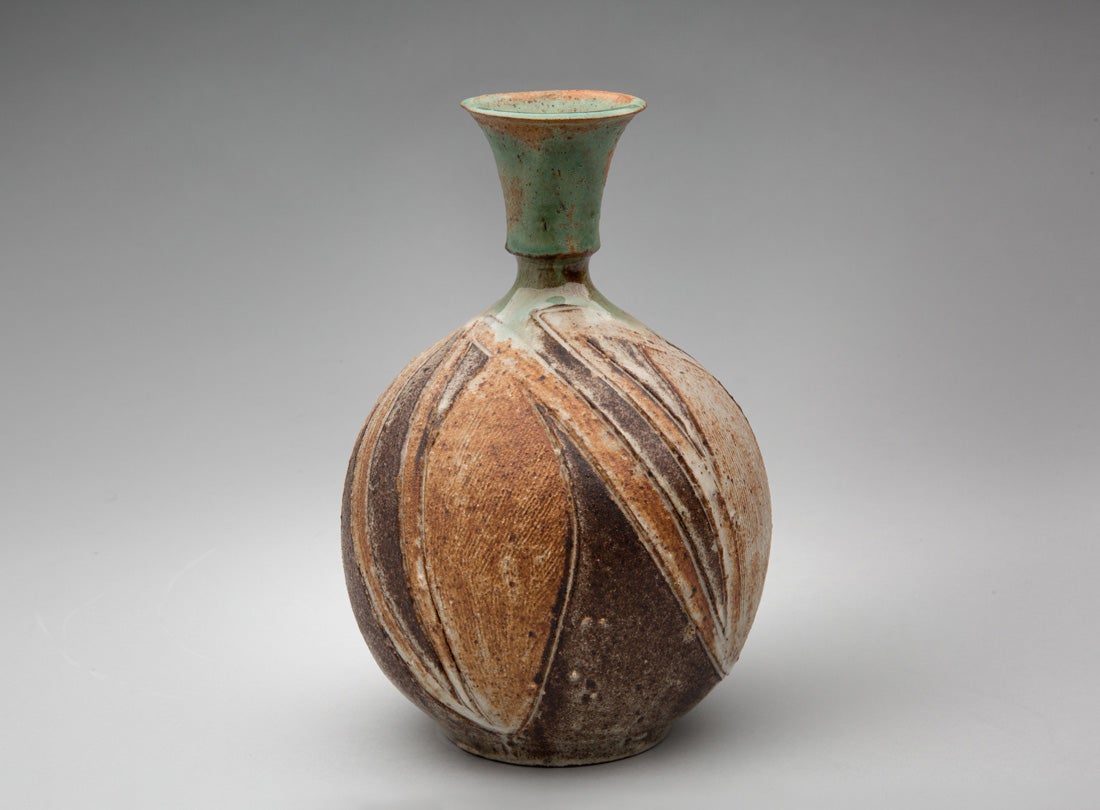 Carved bottle  c. 1972