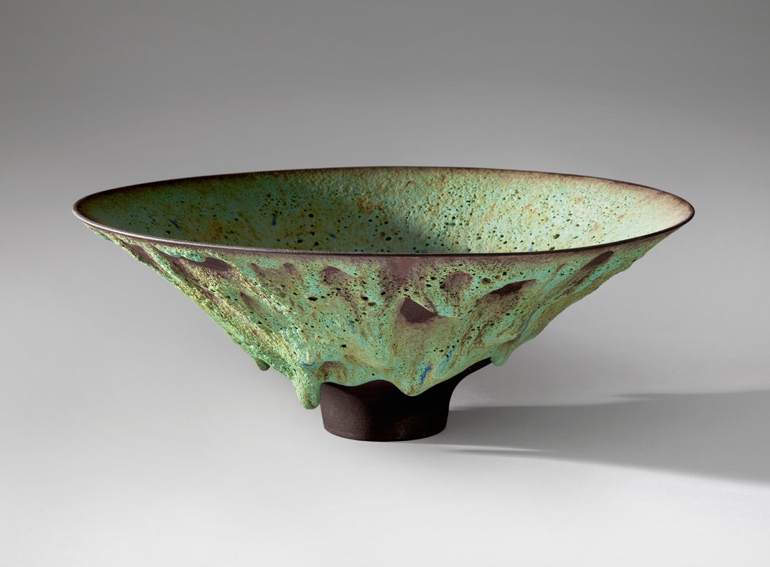 Bowl  2002 James Lovera (b. 1920) porcelain, pale green lava flow glaze over black slip L2013.2601.001