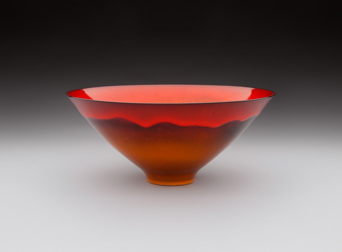 Fire Flow Bowl  2005 James Lovera (b. 1920) porcelain, red-orange flowing glaze over dark slip L2013.2601.018