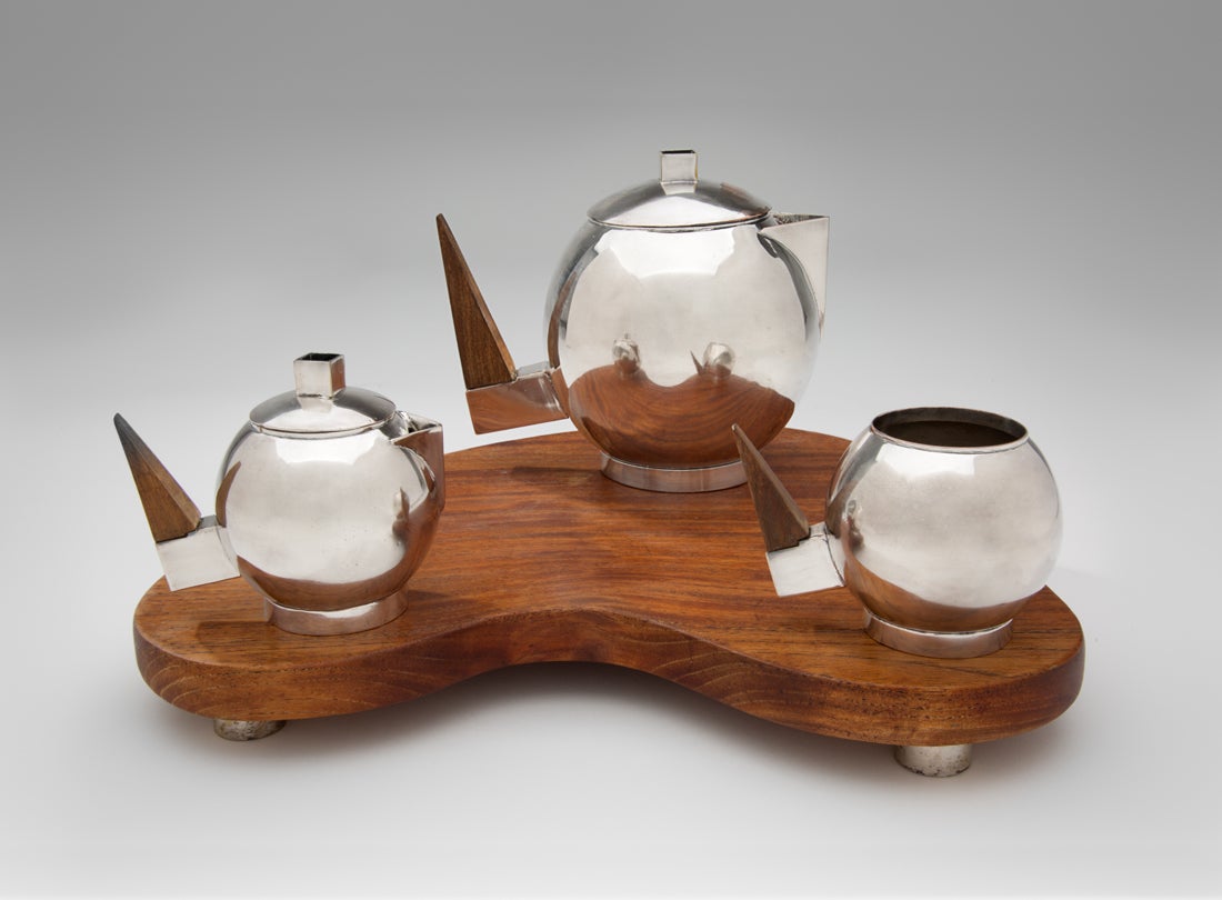 Tea set: teapot, sugar, creamer, tray  1950