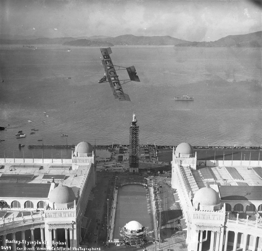 Lincoln Beachey performing in his biplane over the Panama-Pacific International Exposition grounds, San Francisco  December 25, 1913