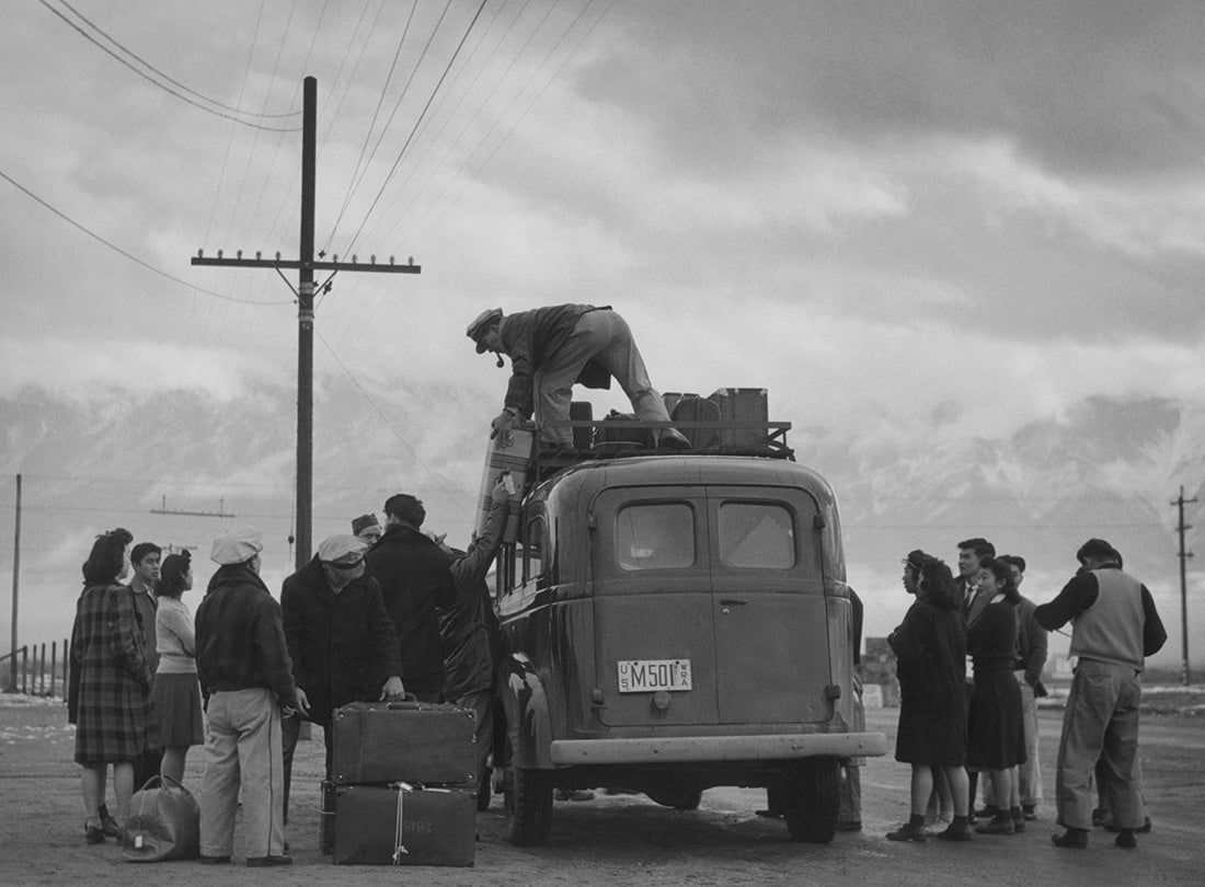 Loading bus, leaving Manzanar for relocation  1943