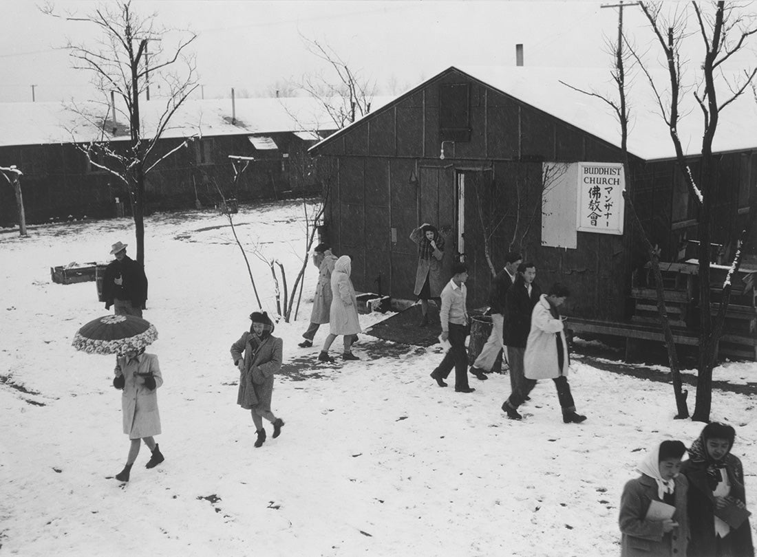 People leaving a Buddhist church during the wintertime  1943