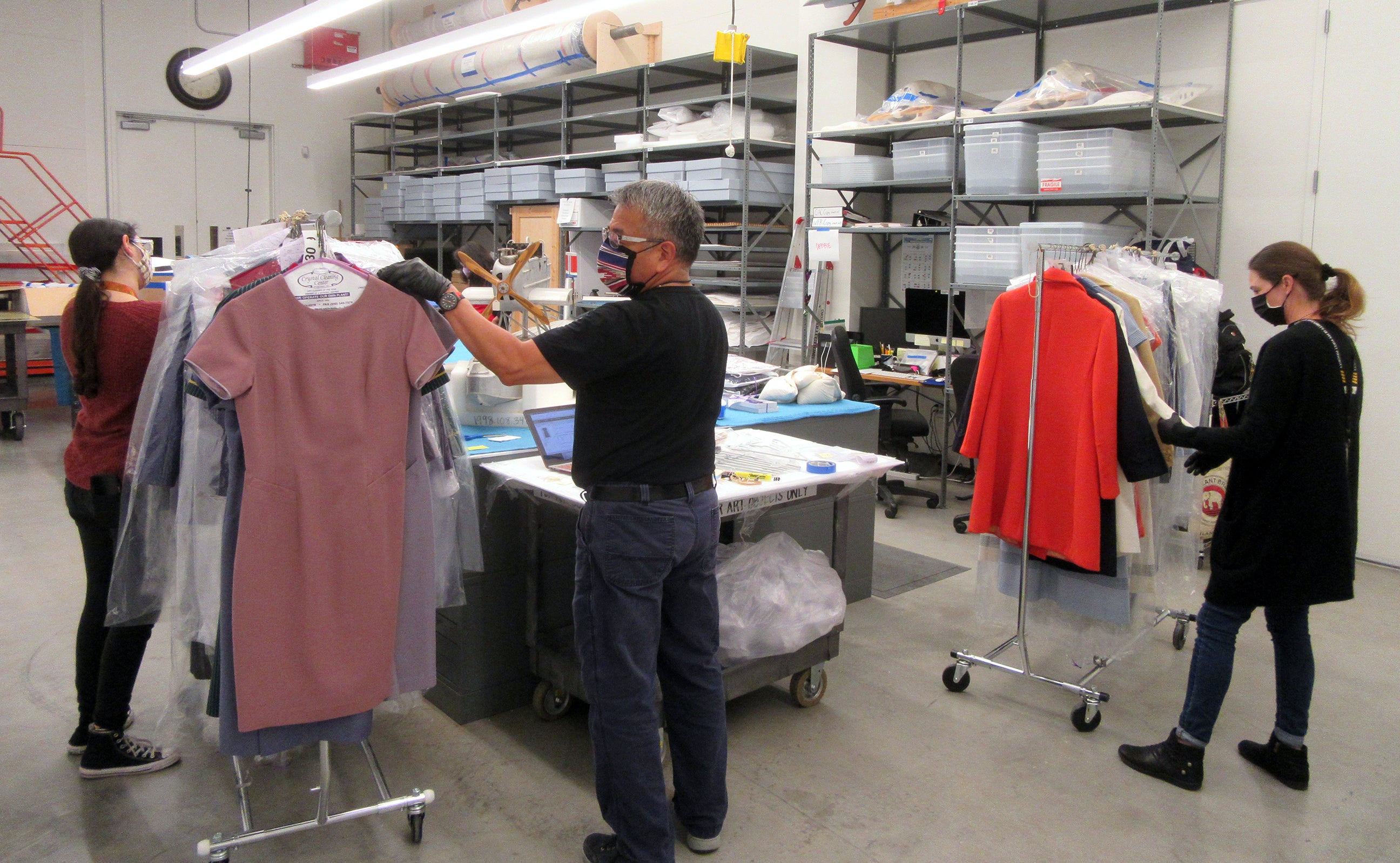 The Collections team preps airline uniforms for studio photography