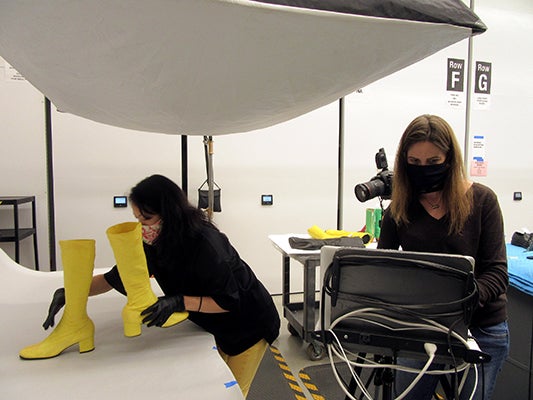 The studio configuration varies according to object type, with laydown formats for garments and signs, and a tripod arrangement for standing objects with multiple viewpoints