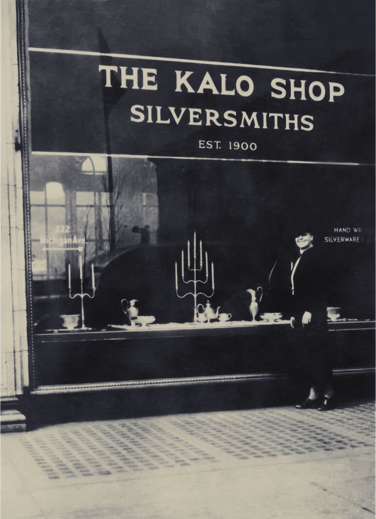 Clara Barck Welles standing by the Kalo Shop window  1937 Chicago  Sharon S. Darling Collection, gift of Robert R. Bower R2023.0203.001