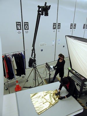 The studio configuration varies according to object type, with laydown formats for garments and signs, and a tripod arrangement for standing objects with multiple viewpoints