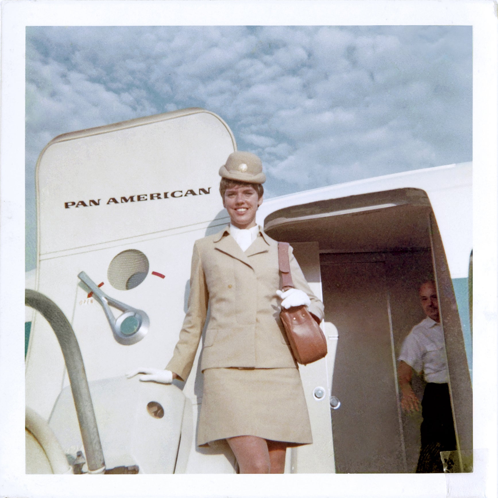 Pan American World Airways (Pan Am) stewardess Kay (Floyd) Gilson at John F. Kennedy International Airport (JFK), New York  1969