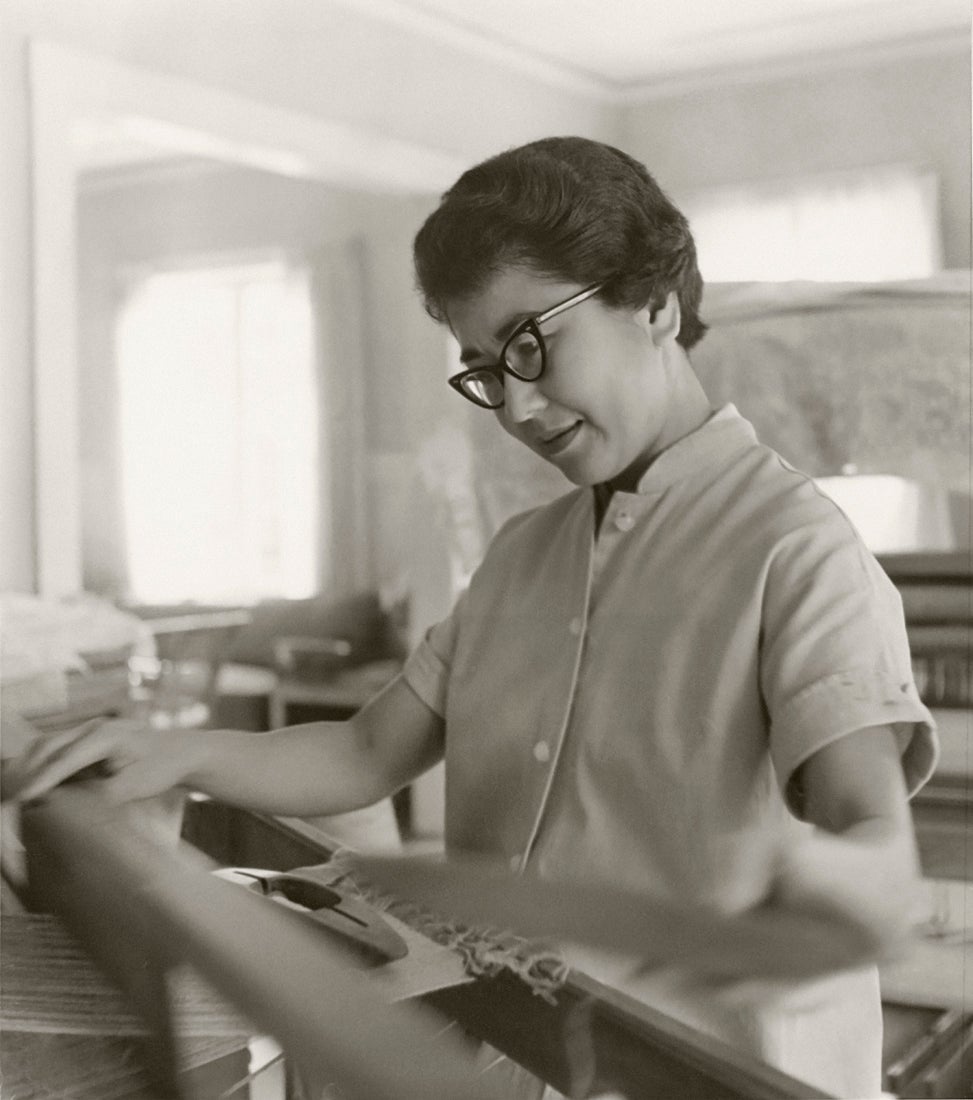Kay Sekimachi at the loom in her home  1950s