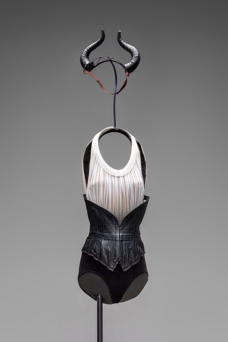 Guernica black-and-white halter leotard with leather corset and horned headpiece  2018