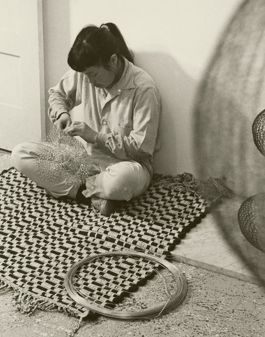 Ruth Asawa making wire sculpture  1956 Paul Hassel (1906–64) Courtesy of the Estate of Paul Hassel and Ruth Asawa Lanier, Inc.  Photograph © Estate of Paul Hassel © 2022 Ruth Asawa Lanier, Inc. / Artists Rights Society, NY. Courtesy David Zwirner R2022.0603.003
