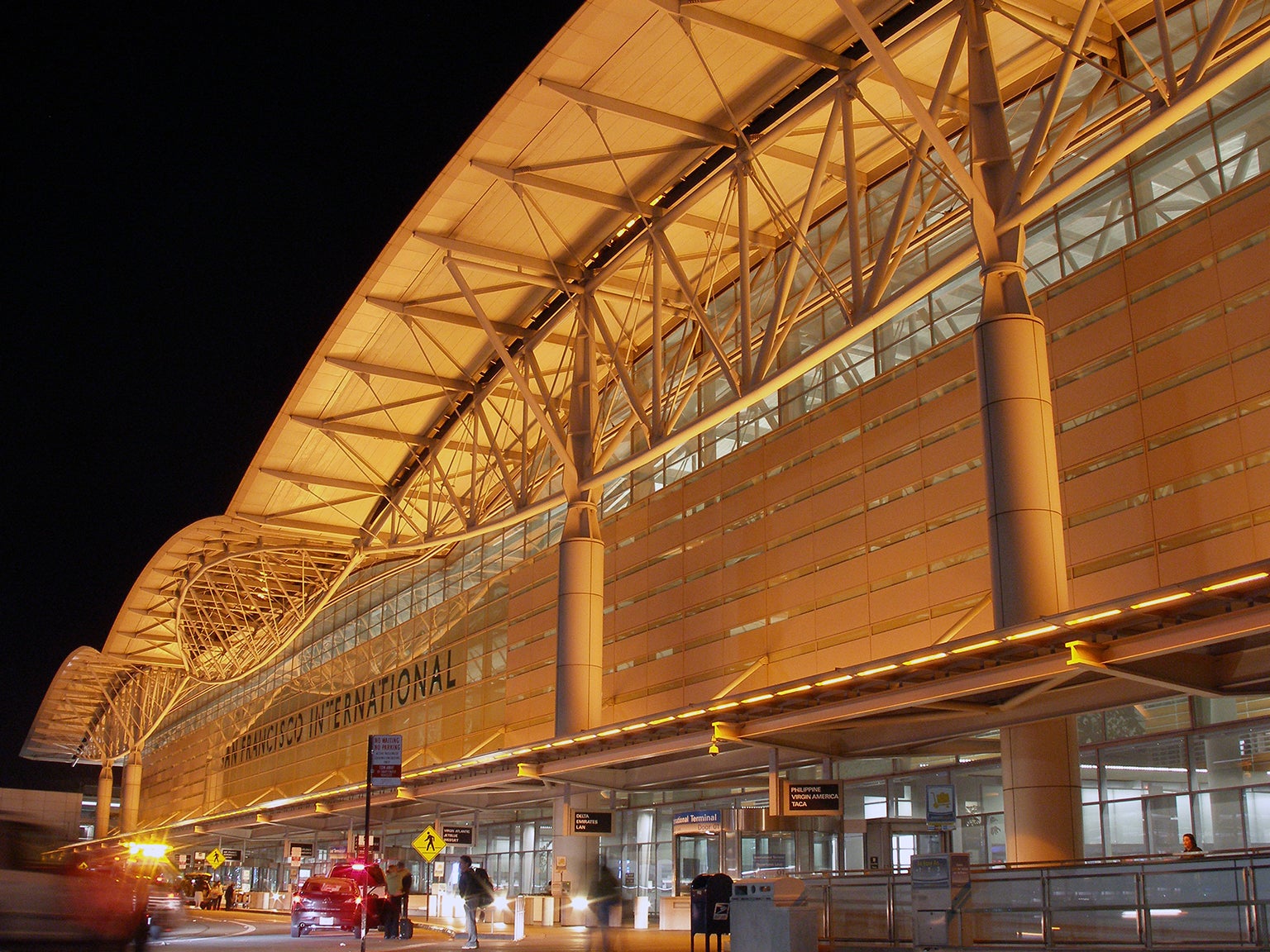 SFO International Terminal with gold lighting to honor San Francisco 49ers 2021