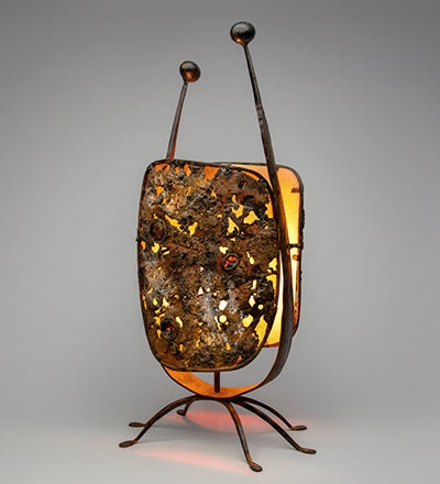 Lamp  c. 1964 C. Carl Jennings (1910–2003) forged steel, cast iron, glass, mica, parchment Collection of Forrest L. Merrill L2019.1501.016