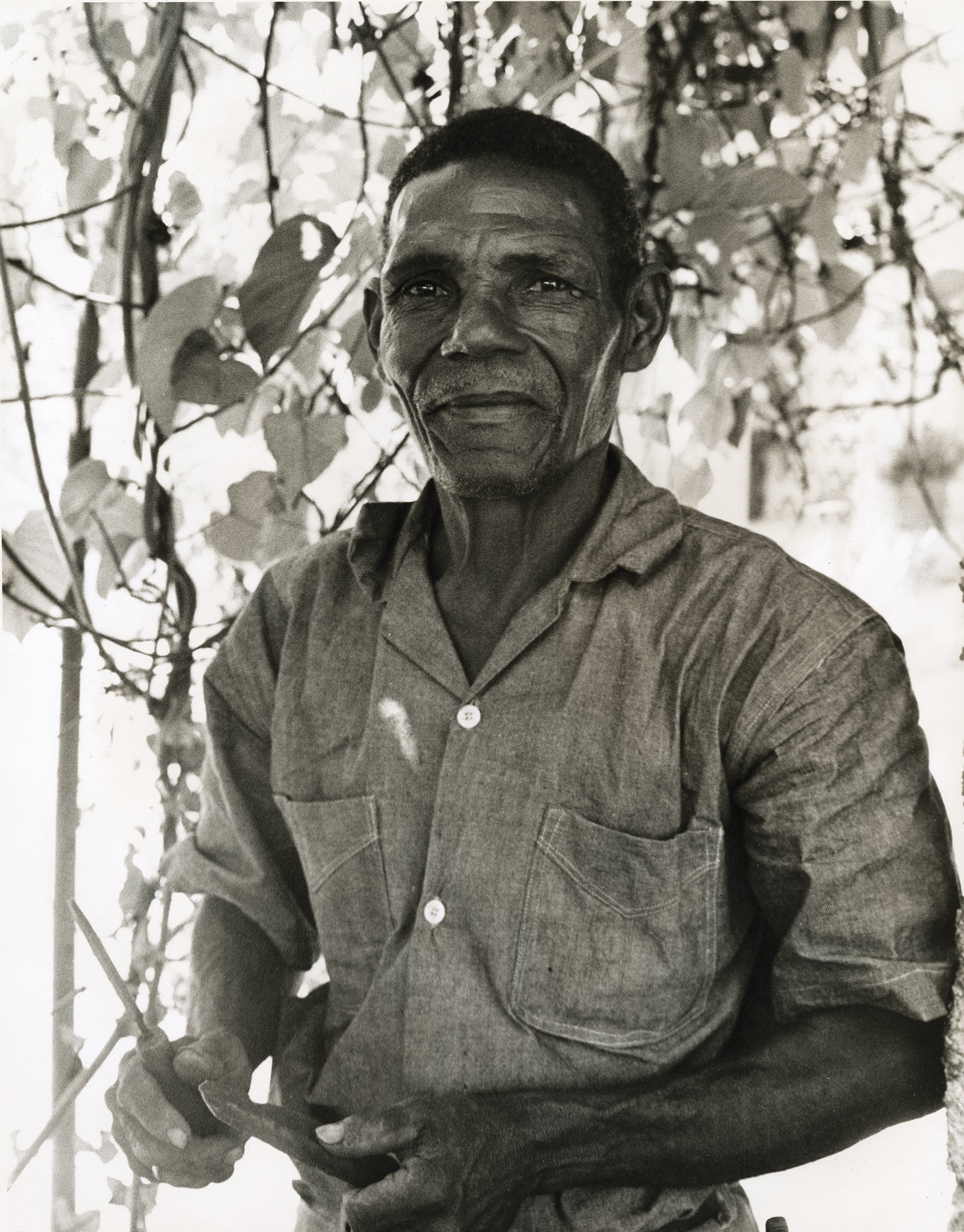 Georges Liautaud with his tools c. 1960s Photograph by William Grigsby Croix-des-Bouquets, Haiti Collection of Larry Kent ©Randall Morris