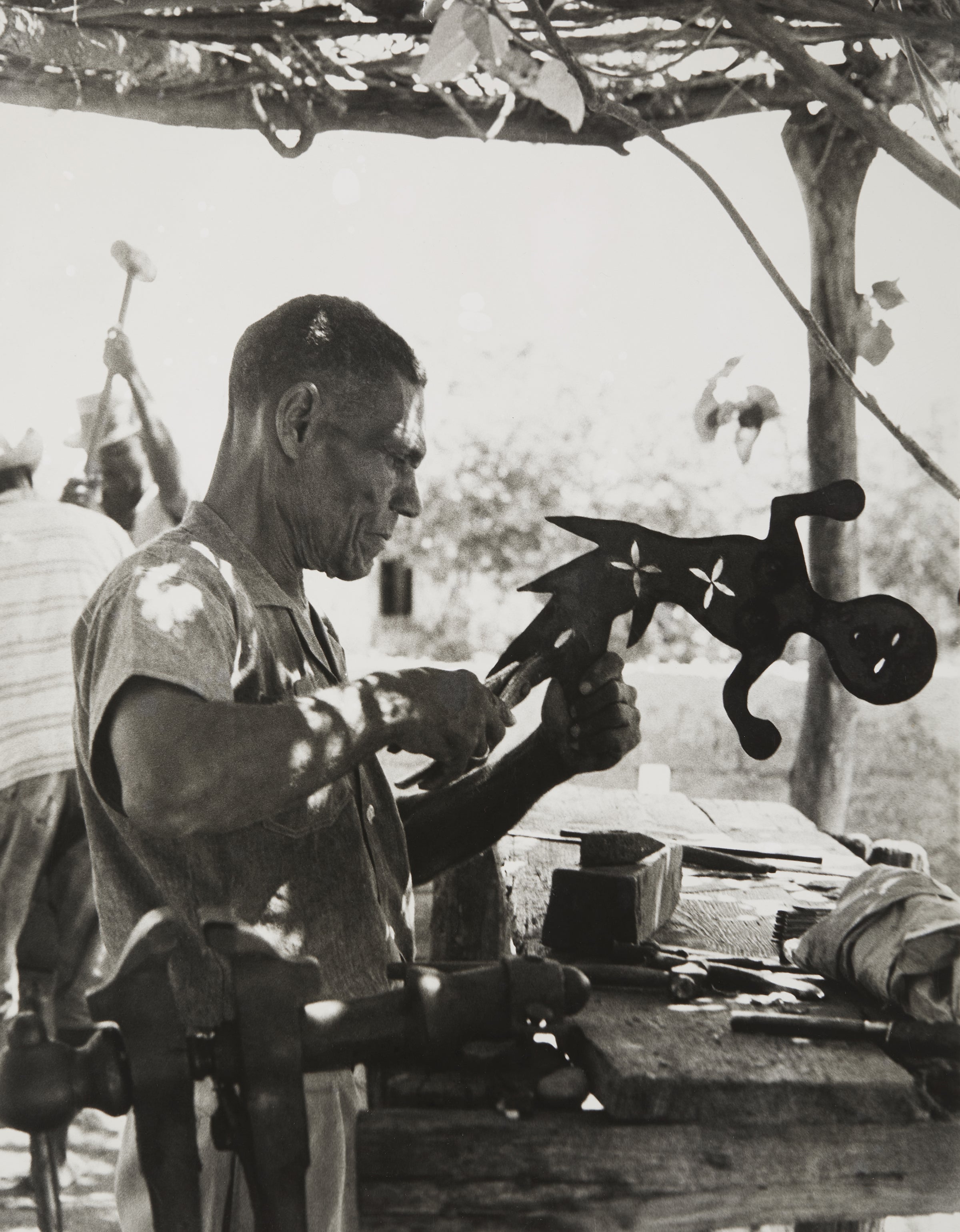 Georges Liautaud working on a sculpture  c. 1960s Photograph by William Grigsby Croix-des-Bouquets, Haiti Courtesy of the Cavin-Morris Gallery ©Randall Morris