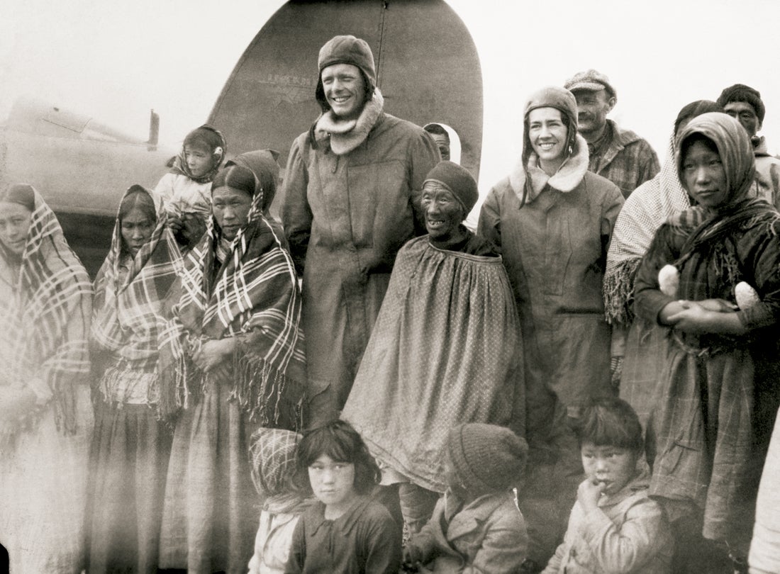 Charles A. Lindbergh and Anne Morrow Lindbergh with Inuit at Baker Lake, Nunavut  c. 1932 