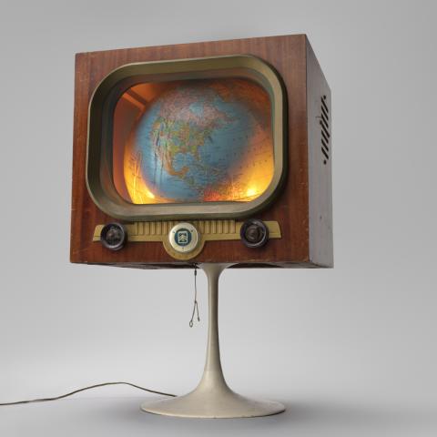 The World is on Television Today  c. 1987 Mickey McGowan (b. 1946) television cabinet, globe, lighting, stand Courtesy of Mickey McGowan, Unknown Museum Archives