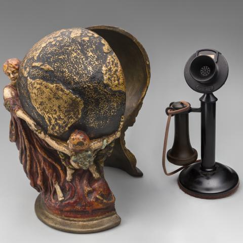 World Globe telephone cover  c. 1921 (with candlestick telephone)
