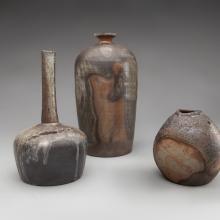 Tall Bottle  2012 Lee Inchin (b. 1957) stoneware with natural wood ash glaze Lent by the artist L2014.1206.006  Bottle Form  1997 Lee Inchin (b. 1957) stoneware with natural wood ash glaze Lent by the artist L2014.1206.007  Flower Vase  2002 Lee Inchin (b. 1957) stoneware with natural wood ash glaze Lent by the artist L2014.1206.004