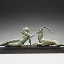 Woman petting a gazelle