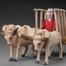 Model ox cart and figure  c. 1958
