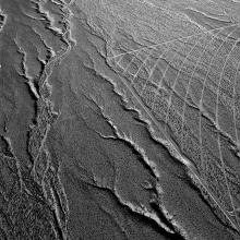 #5490, natural erosion gullies of alluvial slope overlap with boundary and service roads of unit 2  2012